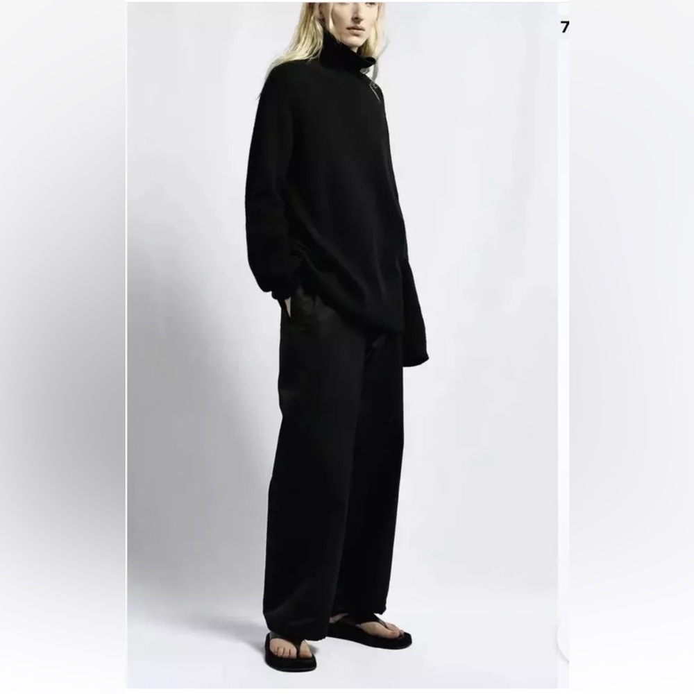 The Row’s black Attie trousers